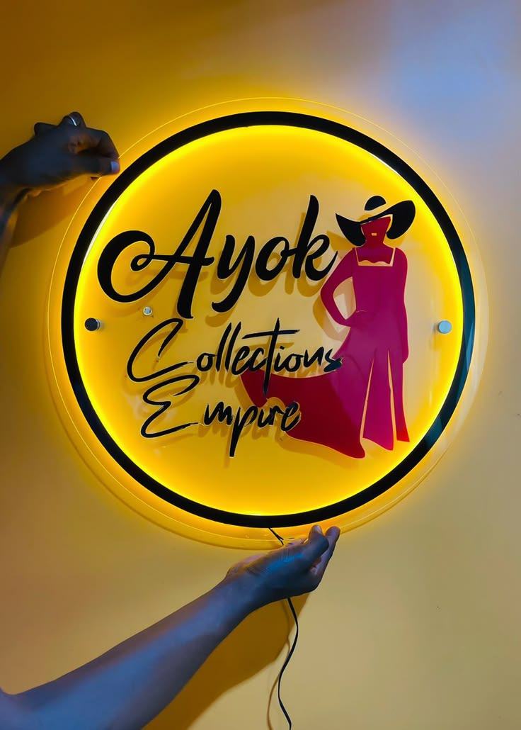 Illuminated Ayok Collections Empire sign